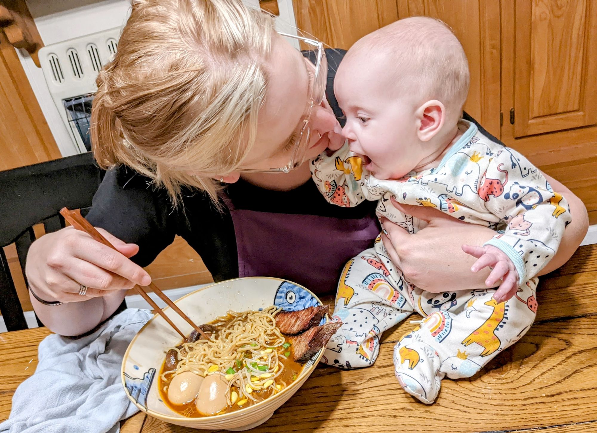 Ramen night with the family — spicy miso bowl with chashu and soft-boiled eggs