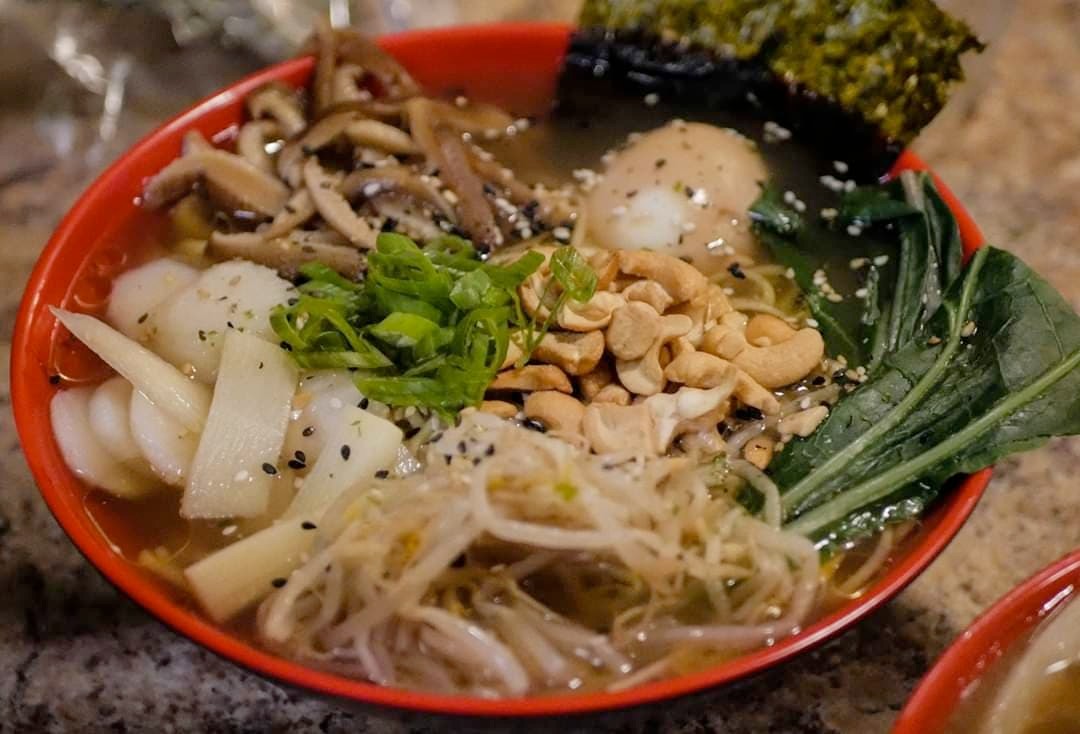 Pho-inspired ramen with bean sprouts, cashews, sesame, greens, and nori